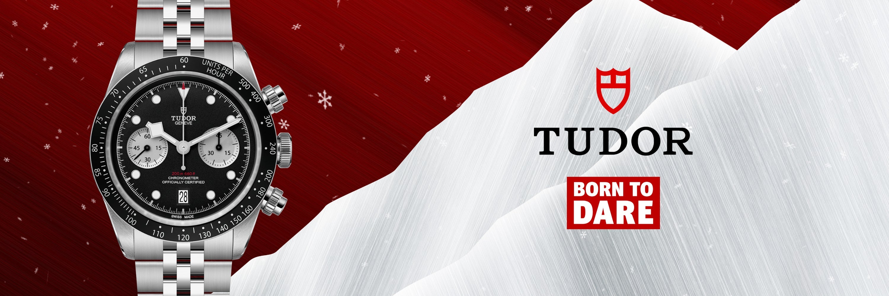 Eine stilvolle Armbanduhr mit goldenem Metallarmband und grünem Zifferblatt getragen von einem Mann in elegantem Outfit.