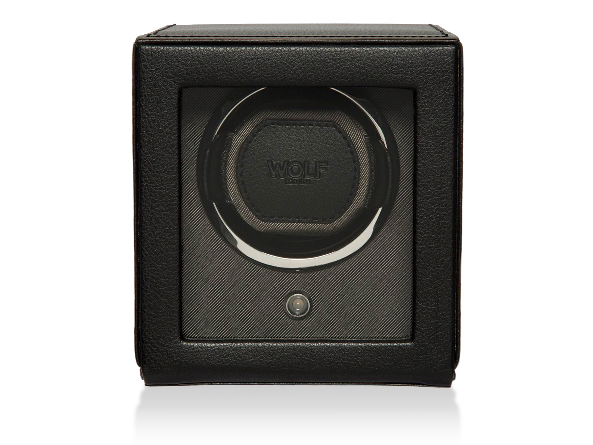 Ein schwarzer, würfelförmiger Schullin UHRENBEWEGER-Uhrenbeweger mit klarem Frontfenster zeigt die runde Halterung und einen einzelnen Knopf darunter, alles vor einem schlichten weißen Hintergrund.