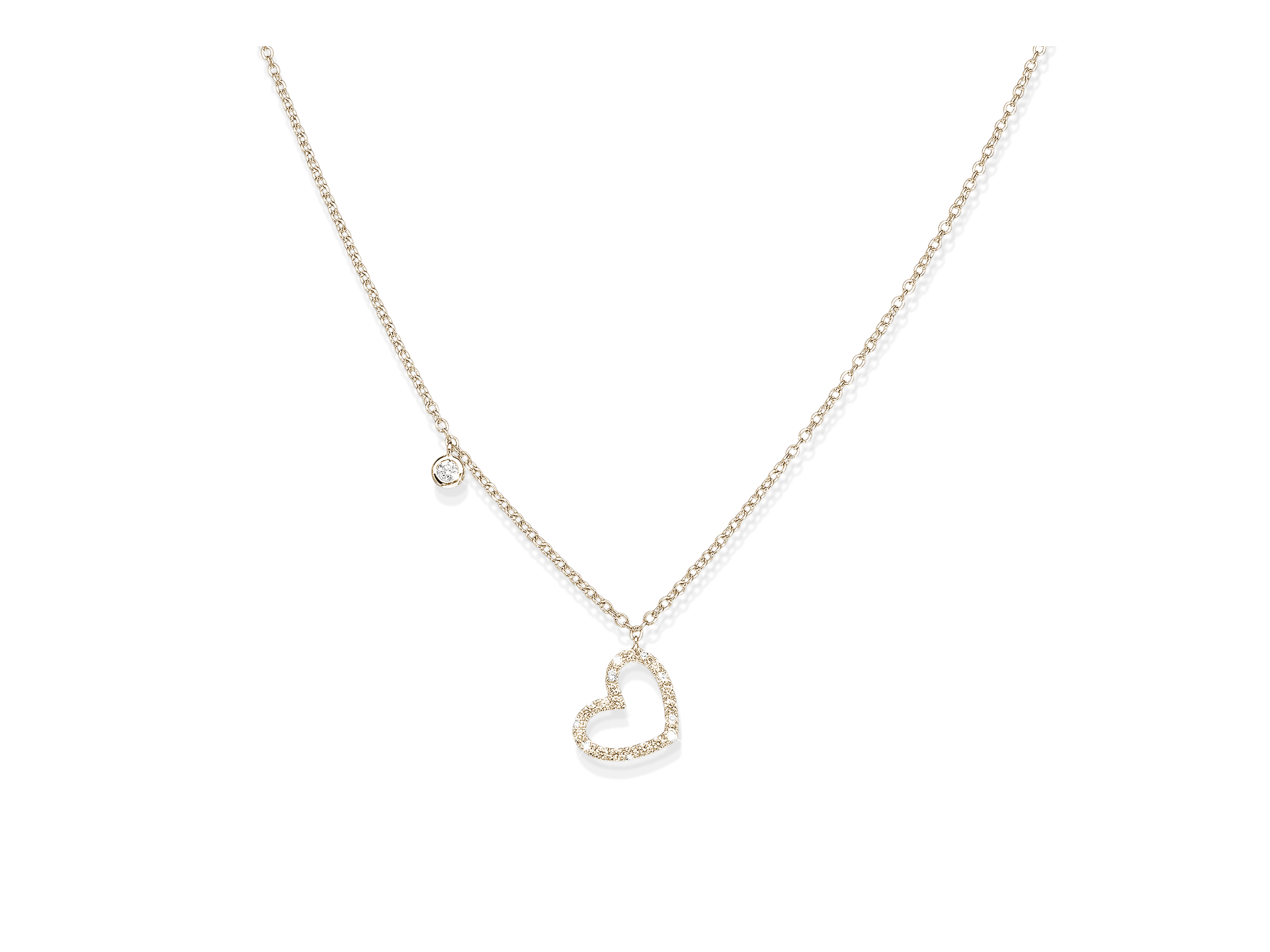 Die Schullin HERZ HALSKETTE ist eine zarte Goldkette mit einem kleinen, mit Edelsteinen besetzten Herzanhänger und einem einzelnen runden Edelsteinanhänger an der Kette, der vor einem weißen Hintergrund steht.