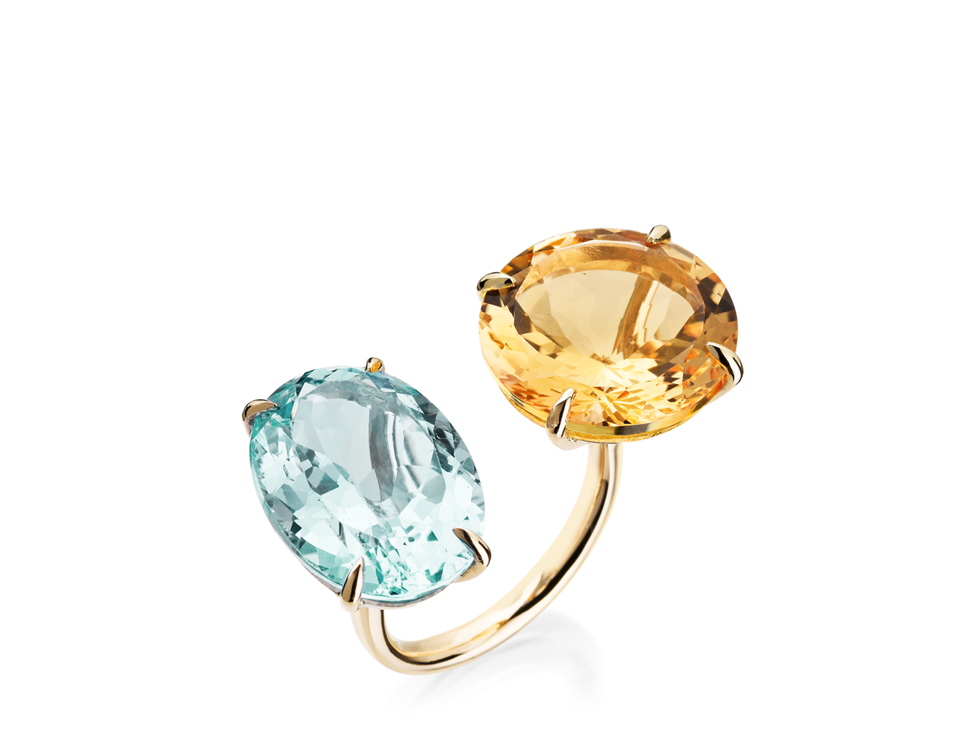 Der Schullin COCKTAIL RING ist ein offener Goldring mit zwei großen ovalen Edelsteinen - einem hellblauen und einem goldgelben - in Vier-Zacken-Fassungen an beiden Enden, die vor einem schlichten weißen Hintergrund gezeigt werden.