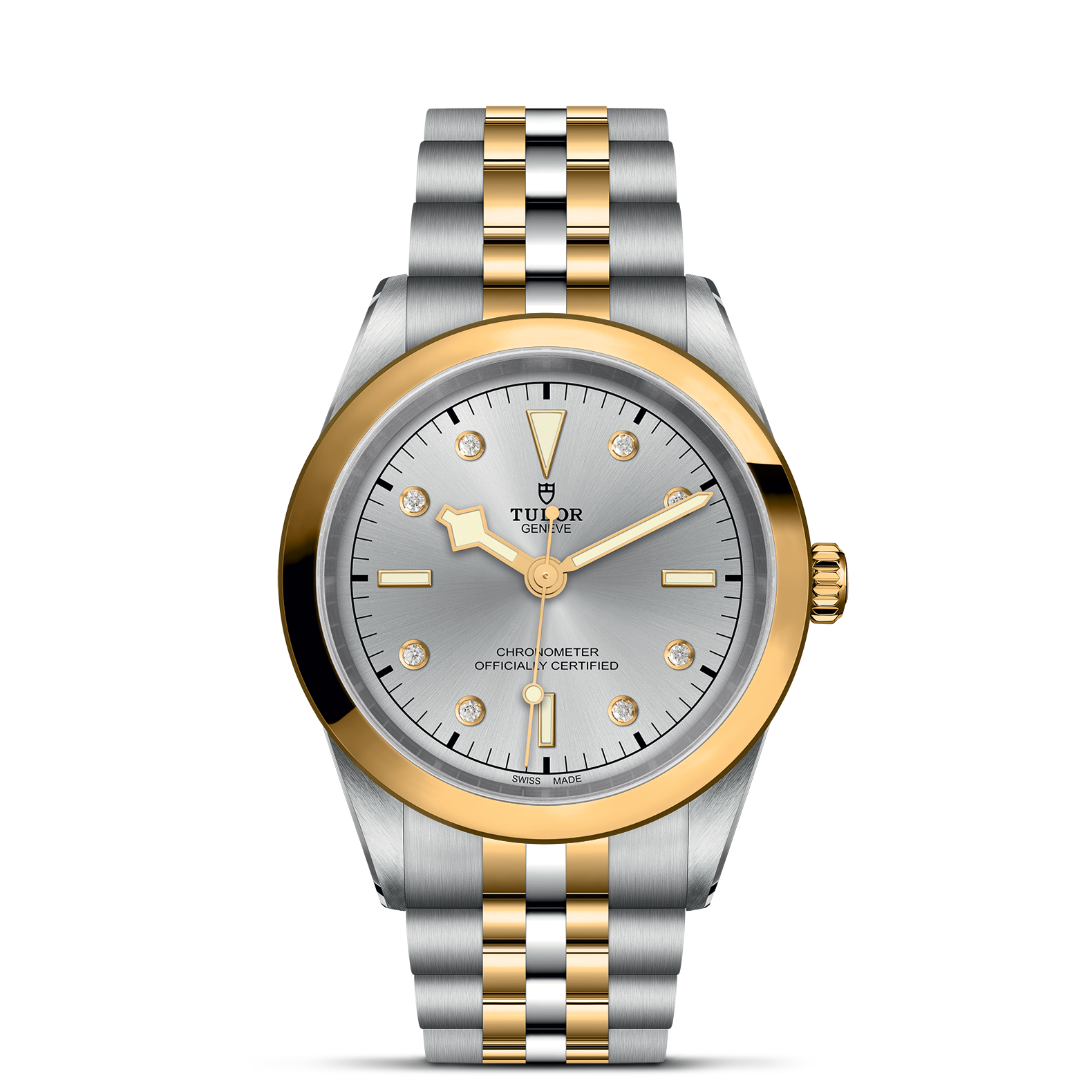 Die TUDOR BLACK BAY ONE von Schullin ist eine luxuriöse Armbanduhr mit einem silbernen und goldenen Metallband, einem silbernen Zifferblatt, einer goldenen Lünette, diamantenen Indizes, goldenen Indexen und drei zentralen Zeigern für Stunden, Minuten und Sekunden.