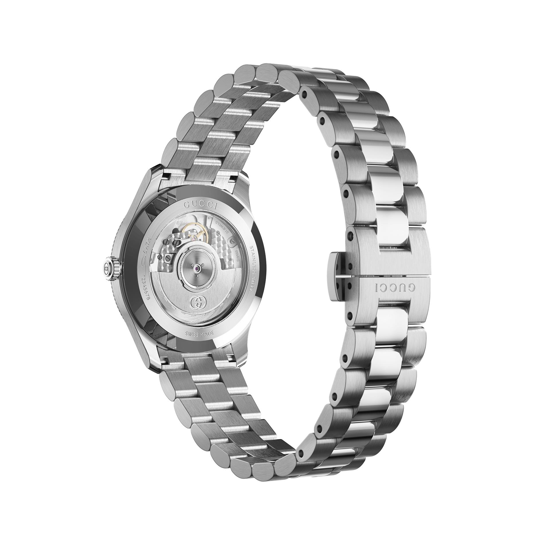 Eine elegante, silberne GUCCI G-TIMELESS-Armbanduhr mit Edelstahlarmband wird von der Seite gezeigt, wobei die transparente Rückseite den Blick auf das komplizierte Automatikwerk im Inneren freigibt.