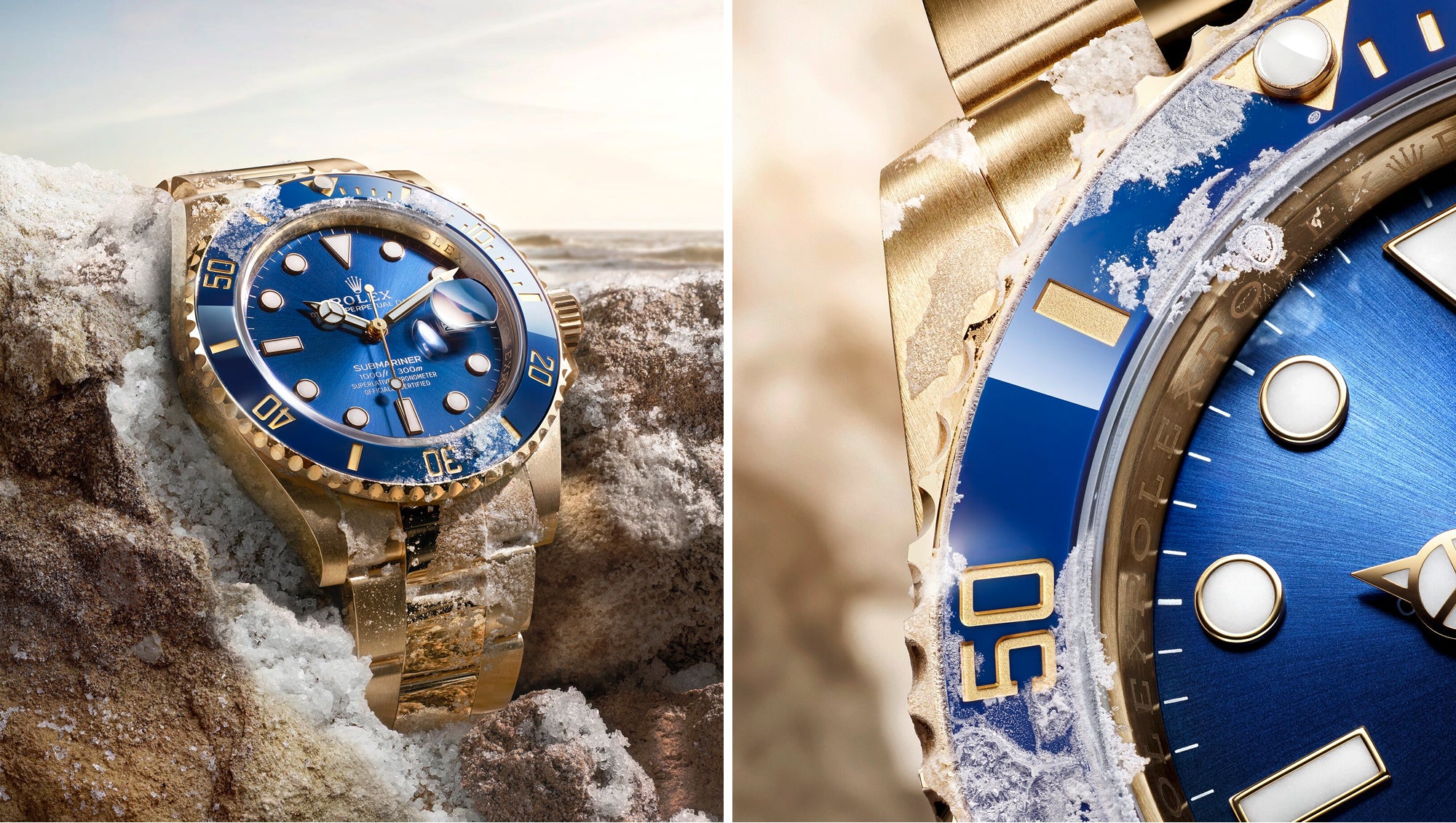 Nahaufnahmen einer goldenen Uhr mit blauem Zifferblatt und blauer Lünette, die teilweise mit Schnee und Eis bedeckt ist und auf einer verschneiten, felsigen Oberfläche bei natürlichem Licht liegt. Der Markenname "Rolex" ist auf dem Ziffernblatt sichtbar.