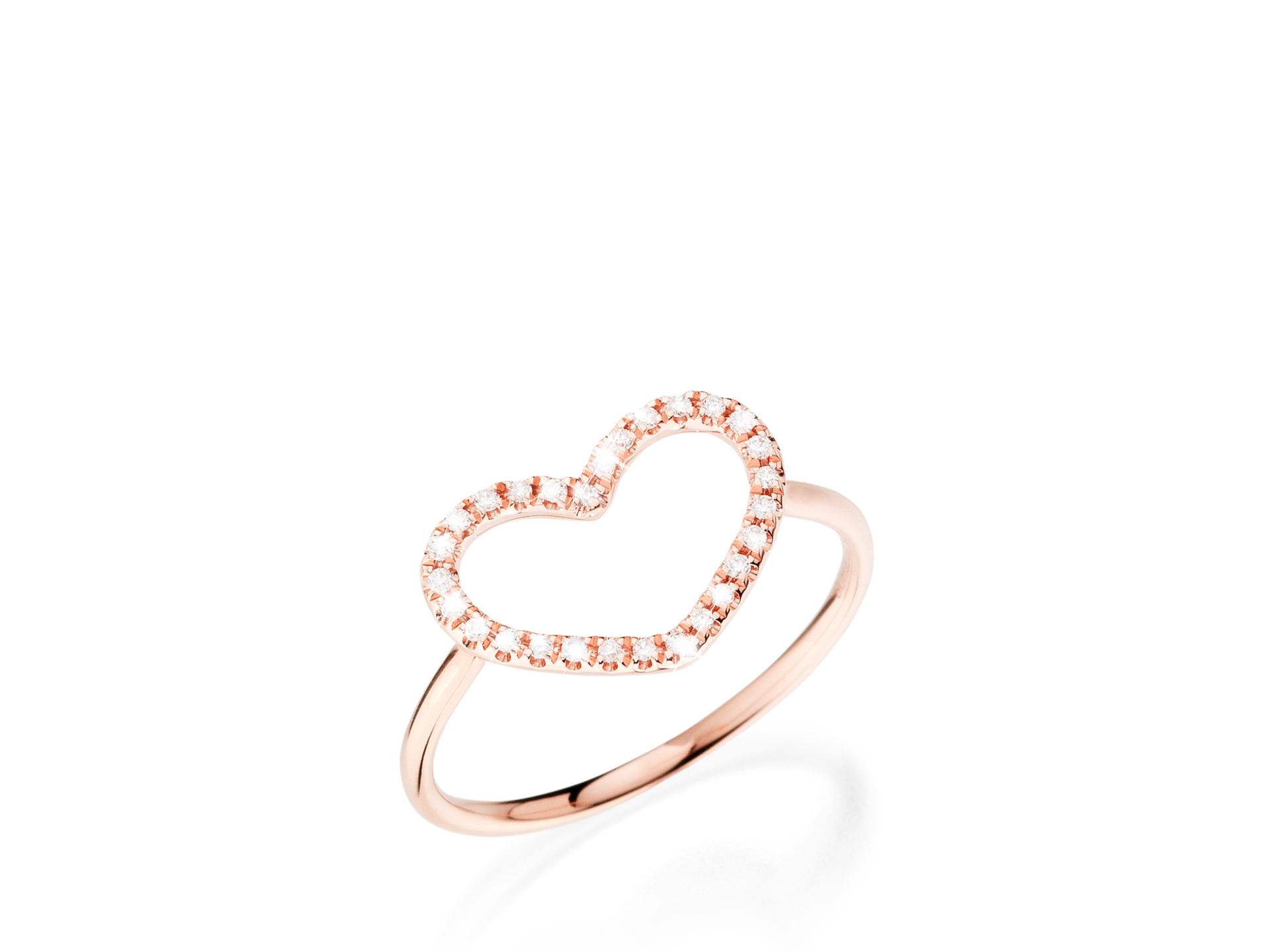 Ein Ring von Schullin, der DIAMANT RING HERZ, zeigt ein herzförmiges Design in Roségold, verziert mit kleinen funkelnden Diamantsteinen auf einem schlichten Band.